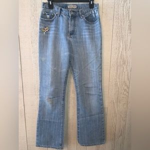 Embroidered vintage flared jeans. Size 25.